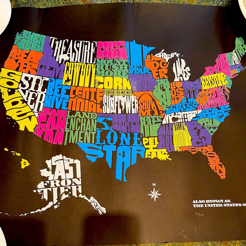 25”x 19” poster of United States and their nicknames. Rich black background.
